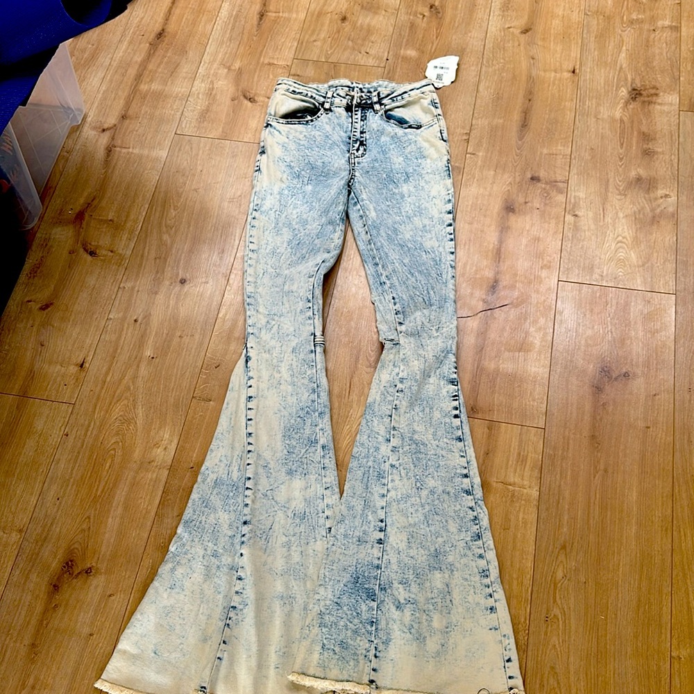 Flared jeans size small. Never worn with tags.